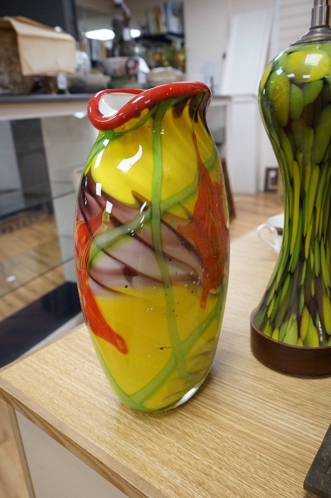 A faux glass lamp base with chome fitting and an art glass vase, lamp base 65cm high